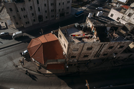 Aerial View of a Densely Populated City Street with Traditional Architecture and Distinctive Roof, Aman