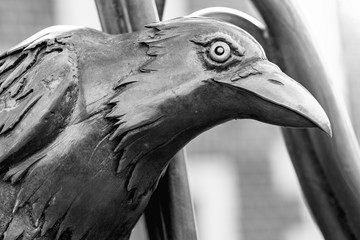 Bronze monument with a crow