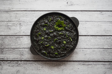Obraz na płótnie Canvas Black beans chili. Hot black chili in the pan. 