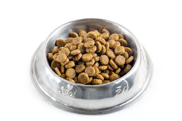 dry pet - dog food in metal bowl on white background