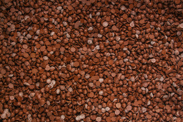 chocolate drops (sweets). food background. copy space. top