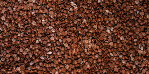 chocolate drops (sweets). food background. copy space. top