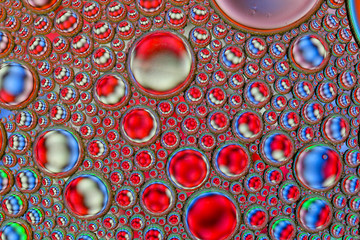 Abstract textured background of colorful oil and water bubbles