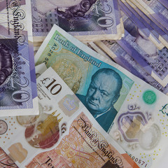 Closed up of different pound sterling banknotes. United Kingdom currency
