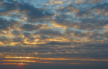 Black dramatic clouds in the sky at sunset, natural cloudscape