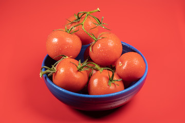 Whole Tomatoes in Blue Bowl