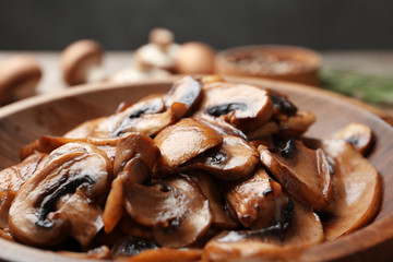 Plate of tasty fried mushrooms, closeup view