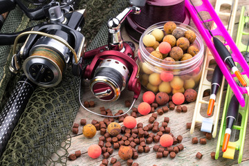 Fototapeta na wymiar fishing tackle on a wooden table. toned image 