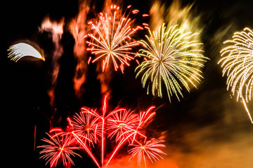 Explosion of multi-colored fireworks in Dubai against the night sky on a new year celebrations...