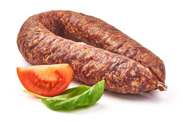 Air dried pork sausage ring and German Bierbeißer, smoked meat, close-up, isolated on white background