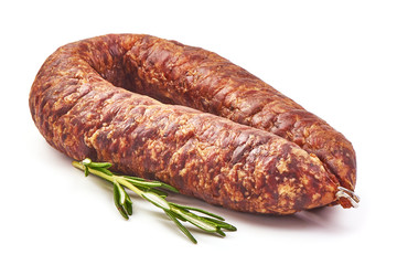 Dried pork sausage, smoked meat, close-up, isolated on white background