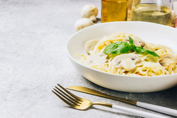 Pasta fettuccine with mushrooms and creamy cheese sauce