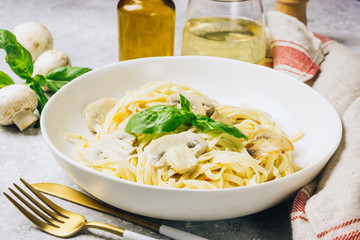 Pasta fettuccine with mushrooms and creamy cheese sauce