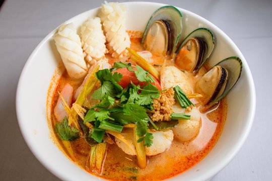 Thai asian spicy seafood noodle soup