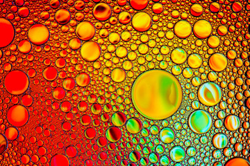 Abstract textured background of colorful oil and water bubbles