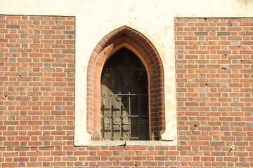 Antique Window in a brick wall