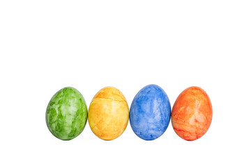Easter eggs in a row isolated on white background