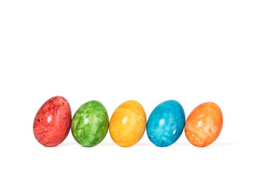 Easter eggs in a row isolated on white background