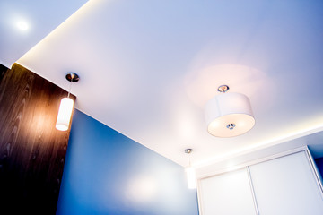 Modern house interior living room decor elements and segments of luxury furnishings of an empty apartment with white ceiling and fixtures