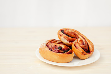 Rustic with black current berry pie on white background.