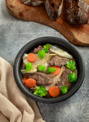 Beef and shallot stew with carrot above view