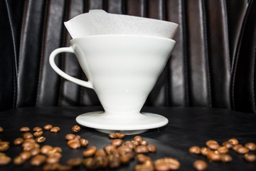 Ceramic funnel for preparation in the alternative. Grain beans. Designed for manual pour-over style coffee brewing. Dripper. V60.