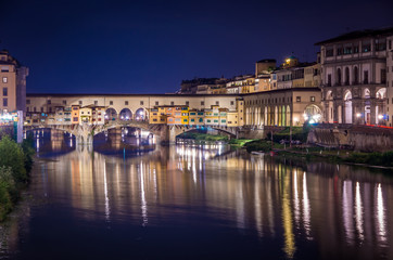 Fototapeta na wymiar Ponte Vecchio in Florence by Arno river at night, Florence, Firenze, Italy