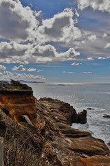 What erosion does to sandstone on the coast