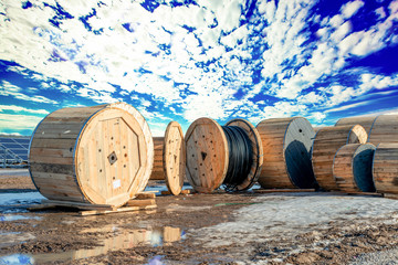 Wooden coils with a high-voltage cable of various sizes