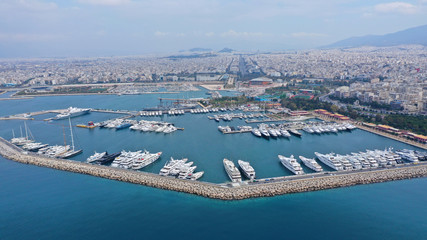 Aerial drone photo of famous Flisvos Marina with mega yachts and sail boats docked, Athens riviera,...
