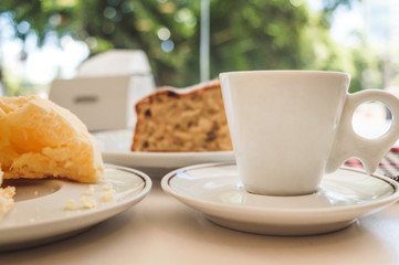 Breakfast table against blurred natural background
