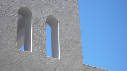 White window against blue sky