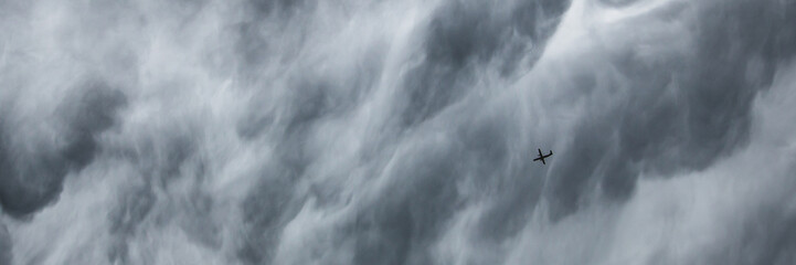 Fototapeta na wymiar Stormy rain clouds background. Dark sky. Dramatic Moody Thunder Storm. Climate Change weather environment background.