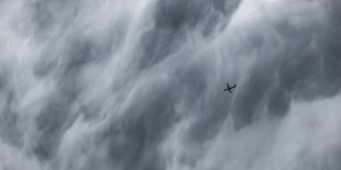 Stormy rain clouds background. Dark sky. Dramatic Moody Thunder Storm. Climate Change weather environment background.