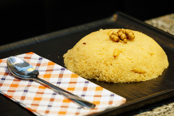 Homemade prepared semolina helva dessert close up view
