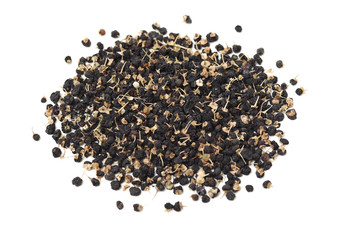 Traditional Chinese black herbs dried wolfberry on white background