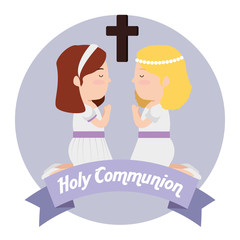 girls with dress and cross to first communion