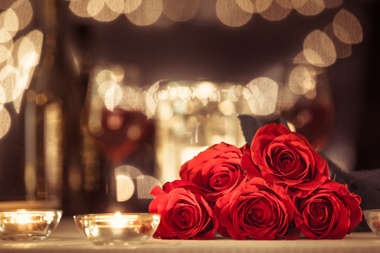 Restaurant Date Night With Roses And Candles