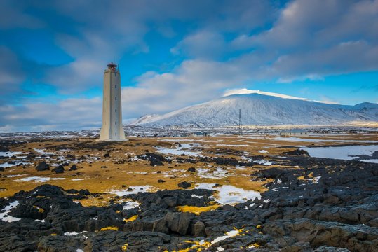 Lighthouse of Malarrif, peninsula Snaefellsnes, in the background the volcano Snaefellsjokull, Vesturland, Iceland, Europe