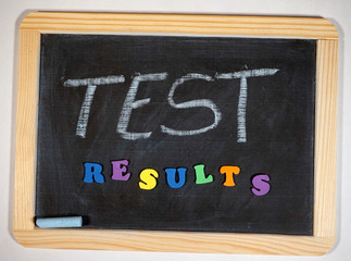 Fototapeta na wymiar Test results message on chalkboard