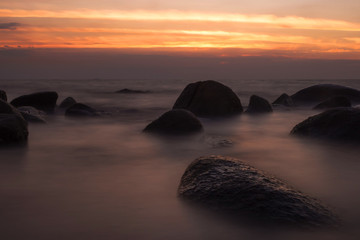 Colorful sunset Seascape.Beautiful sunset with natural rocks salty water,Long exposure