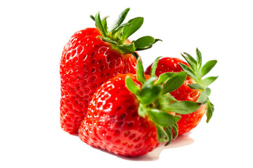 three bright juicy strawberries on a white background, isolate