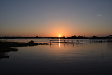 Fototapeta na wymiar Sunset Over the Lake