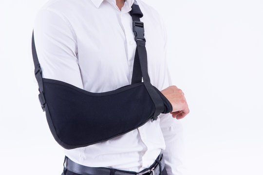 broken hand wearing an arm brace