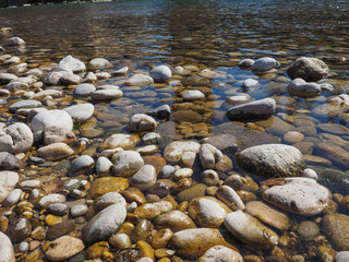 Fototapeta na wymiar cobble in water background
