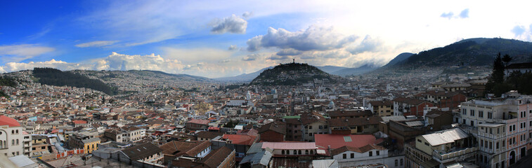 Fototapeta na wymiar Panorama of quito showing the second largest statue of South America at the background with a blue sky