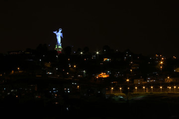 El Panecillo during the night, lit in a blue color