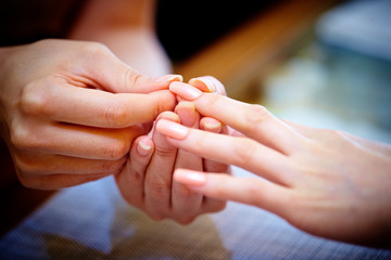 Doing nails at salon