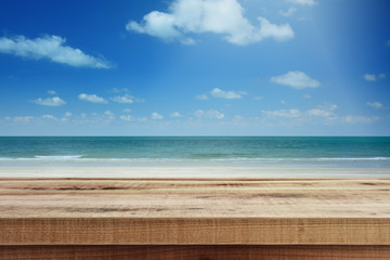 Fototapeta na wymiar Tropical beach background and empty wooden, Summer.