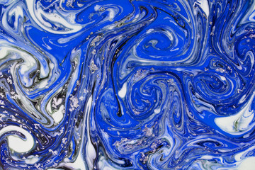 Beautiful abstract painting is a painting technique Ebru .Turkish Ebru style on the water with acrylic paints wring wave.Stylish combination of luxury.Contemporary art marble liquid texture